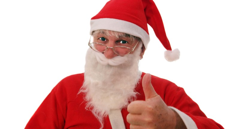 Santa loves Christmas adverts too. Look at him!