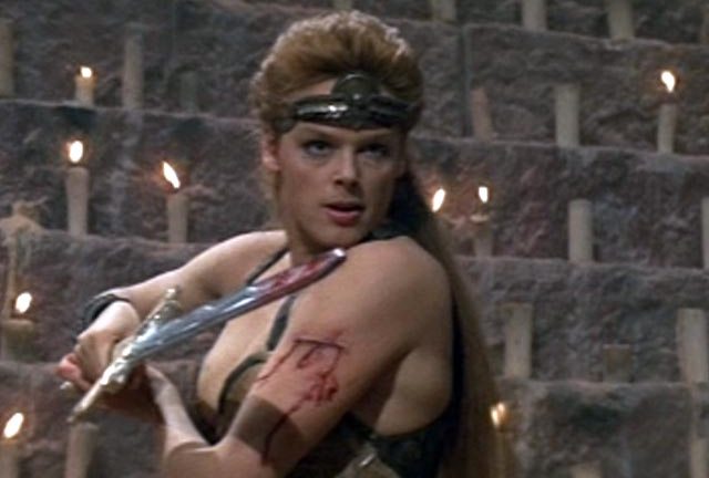 Brigitte Nielson getting stuck in as Red Sonja (1985)