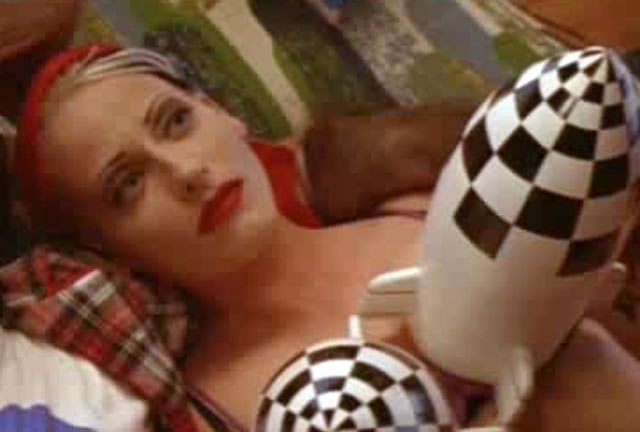 A rare moment of reflection for Lori Petty in Tank Girl (1995)