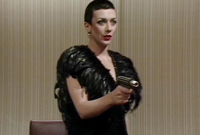 Servalan shooting the man who chose the wallpaper for Animals.
