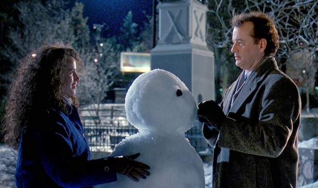 Phil and Rita with a snowman