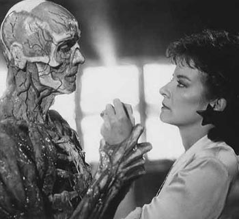 Sean Chapman and Clare Higgins in Hellraiser (1987)