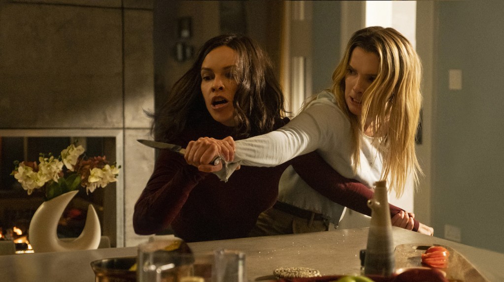 Hillary Swank and Betty Gilpin in The Hunt