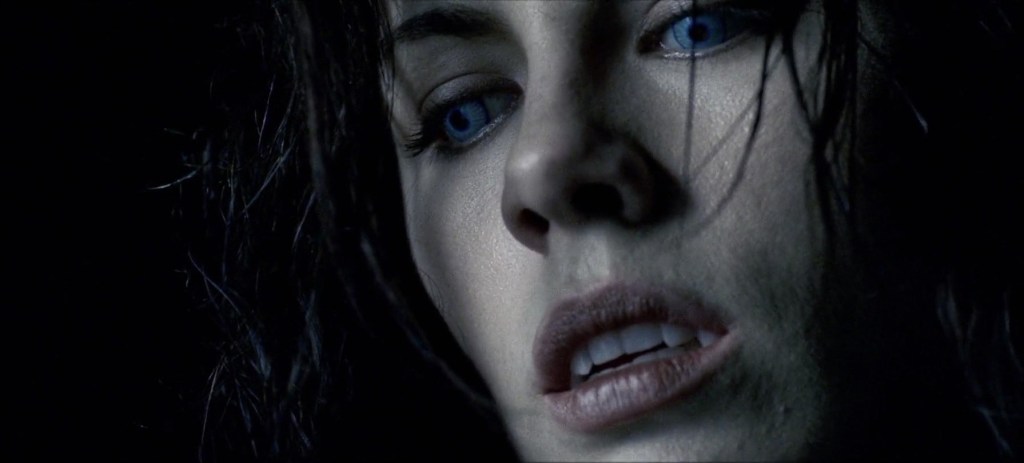 Kate Beckinsale in Underworld with Blue Eyes and Fangs