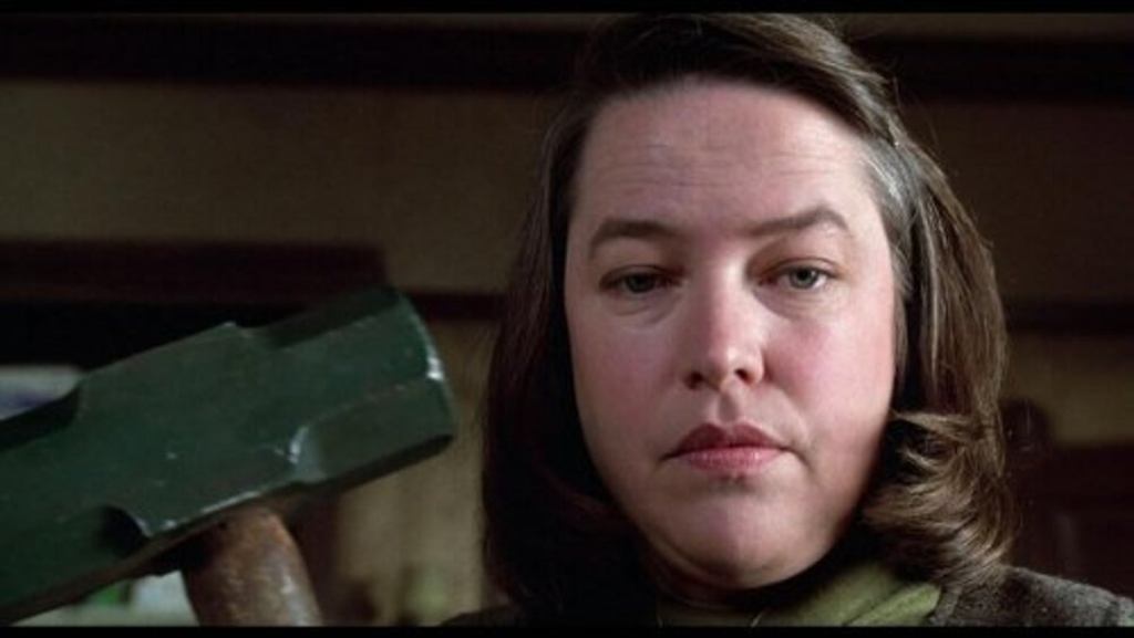 Kathy Bates with Hammer in Misery