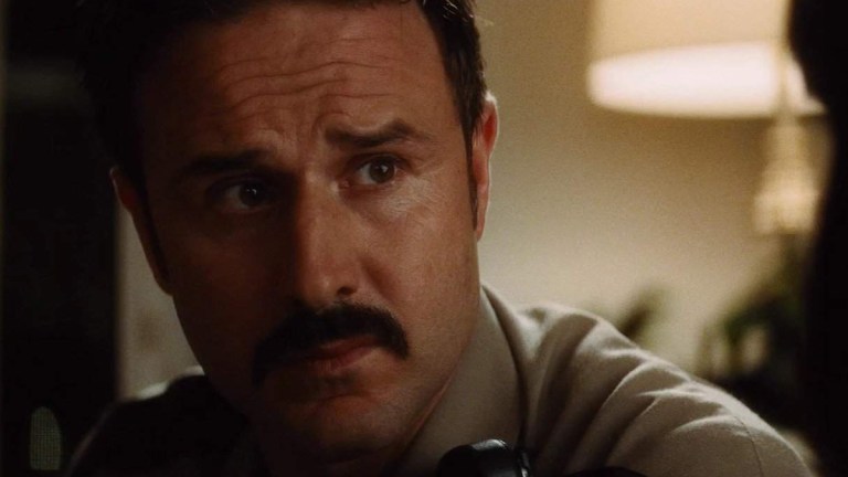 David Arquette as Sheriff Dewey Riley in Scream 4