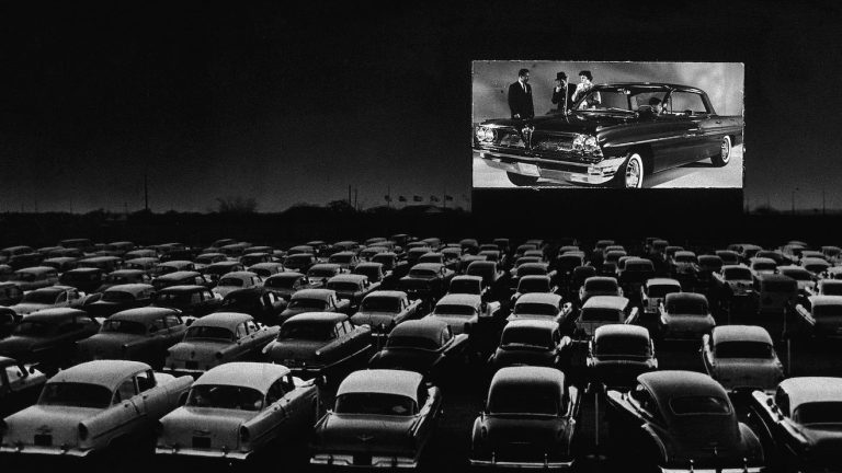 Cars parked at a Movie Theater Drive In