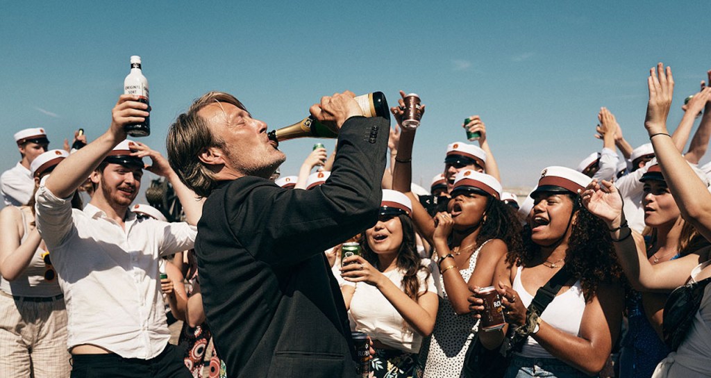 Mads Mikkelsen Drinking Champagne in Another Round