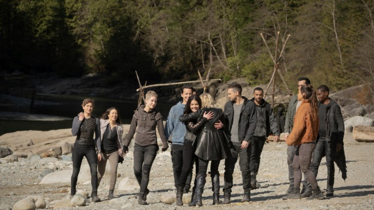 The Cast of The 100 Hugs on a Beach in The Series Finale