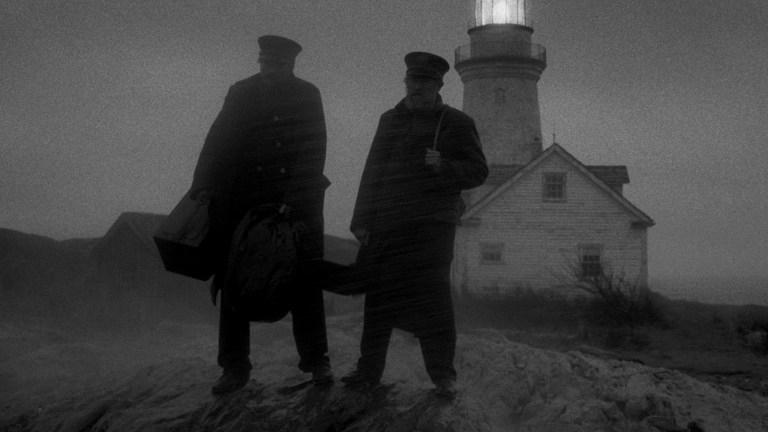 Willem Dafoe and Robert Pattinson in The Lighthouse at night