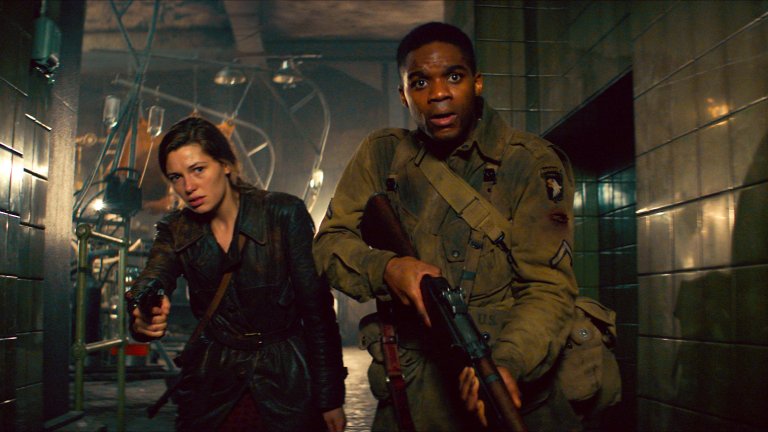 Jovan Adepo as Boyce and Mathilde Ollivier as Chloe in Overlord Movie (2018)