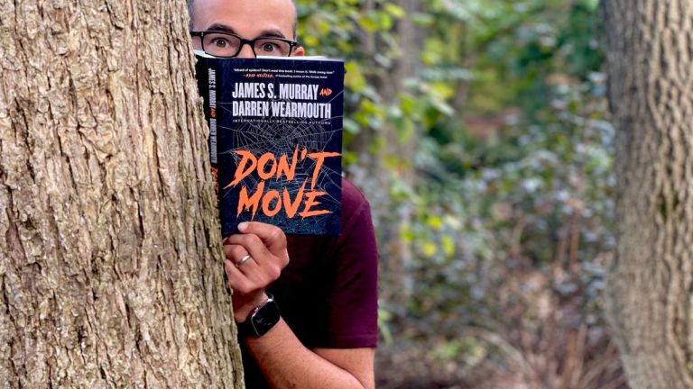 James Murray with book Don't Move