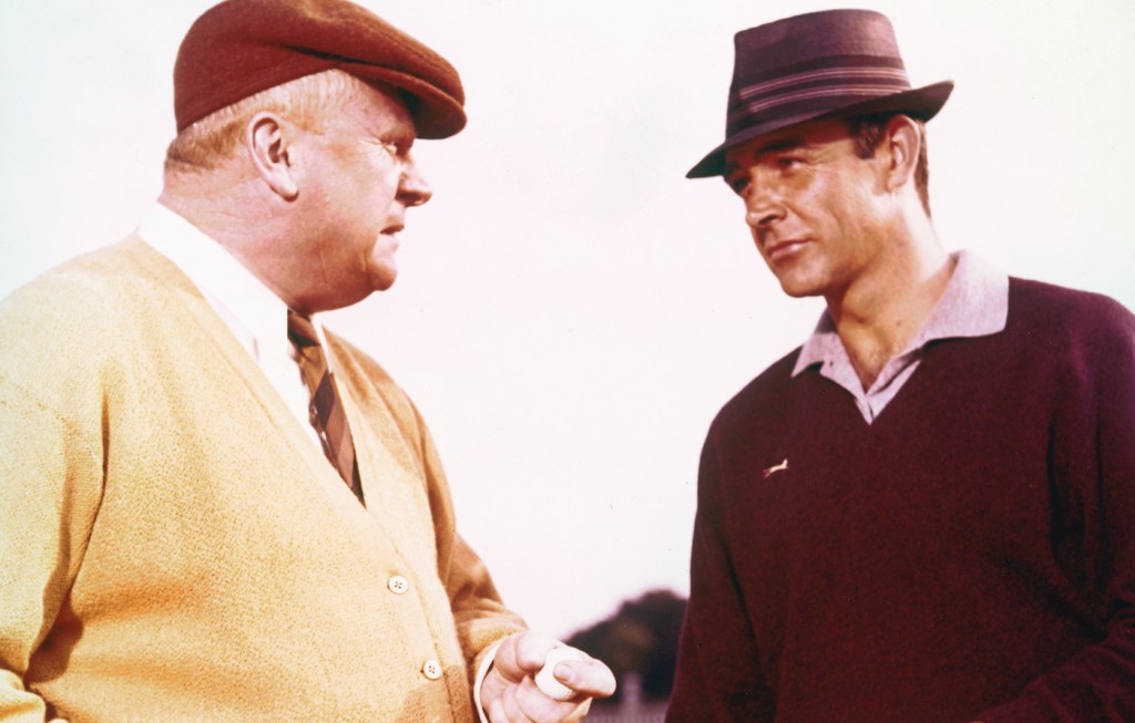 Sean Connery and Gert Frobe in Goldfinger