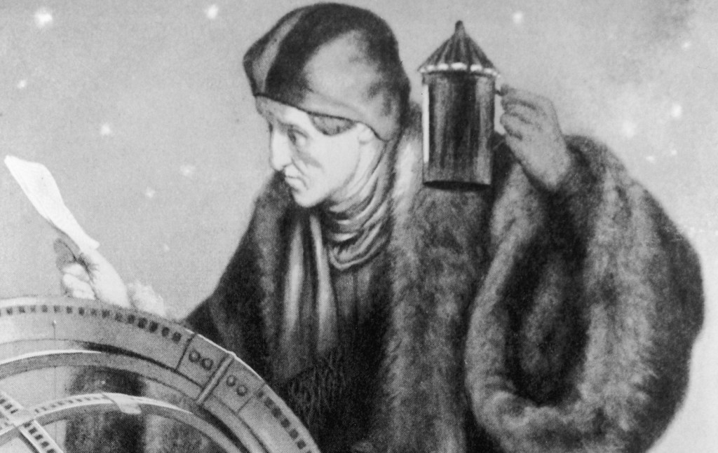 Nicolaus Copernicus with lantern and astronomy