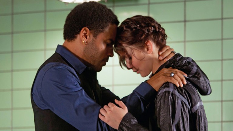 Cinna and Katniss in The Hunger Games