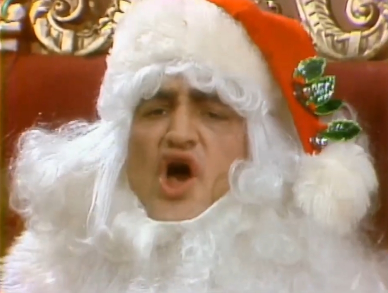 John Belushi as Santa Claus