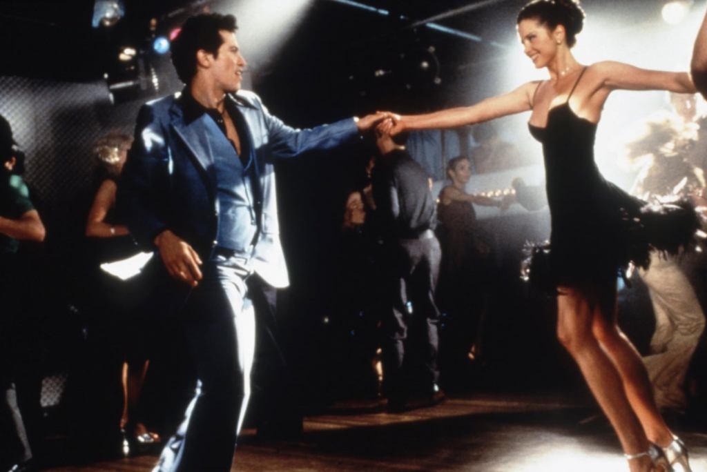 John Leguizamo and Mira Sorvino in Summer of Sam