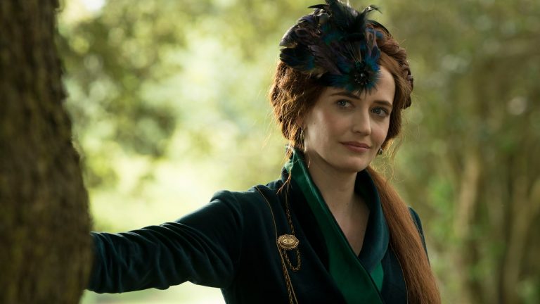 Eva Green wears a hat and leans against a tree in The Luminaries