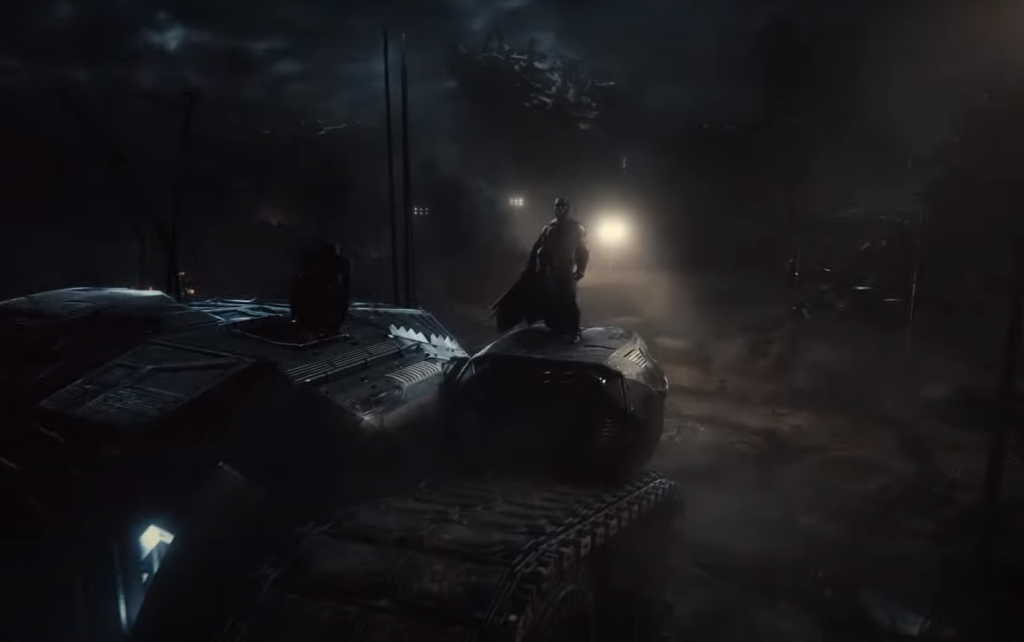 Batman stands on a tank vehicle in Zack Snyder's Justice League