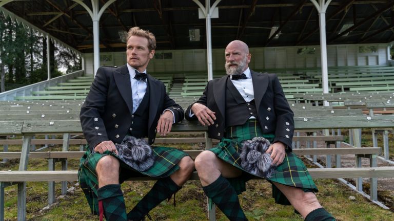 Outlander actors Sam Heughan and Graham McTavish in kilts