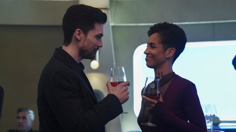 Holden and Naomi make a toast in The Expanse