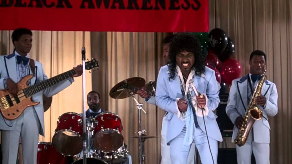 Eddie Murphy como Randy Watson de Sexual Chocolate en Coming to America