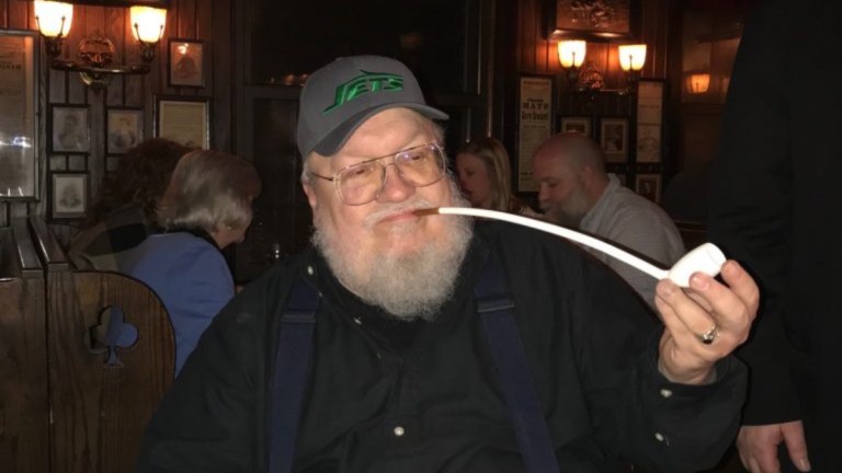 George R.R. Martin in a Jets hat