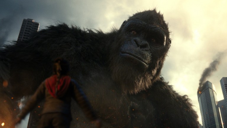 Kong stares at a puny human in Godzilla vs. Kong