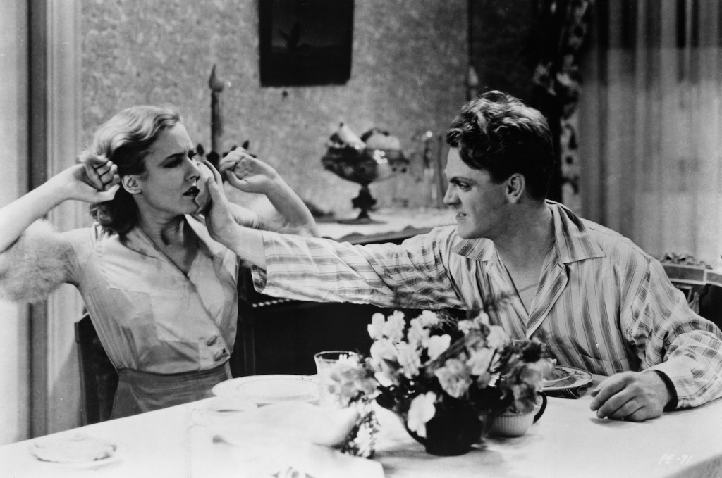 James Cagney shoves grapefruit in Make Clark's face in The Public Enemy