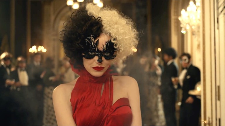 Emma Stone as Cruella de Vil at masked party