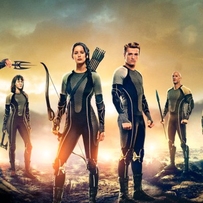 The tributes stand in a line in promo art for Hunger Games: Catching Fire