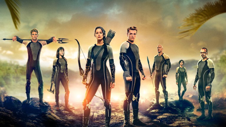 The tributes stand in a line in promo art for Hunger Games: Catching Fire