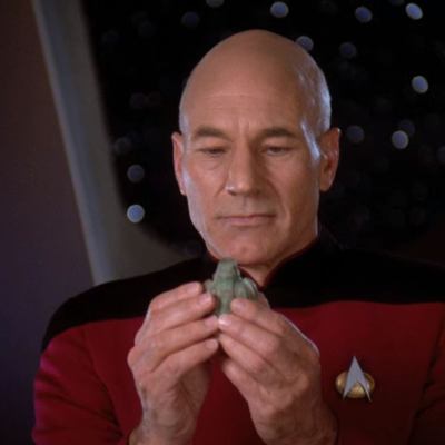 Captain Picard examines an artifact in Star Trek: The Next Generation