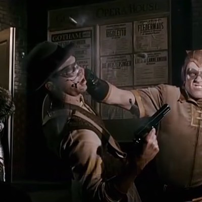 Nite Owl saving Thomas and Martha Wayne in Watchmen.