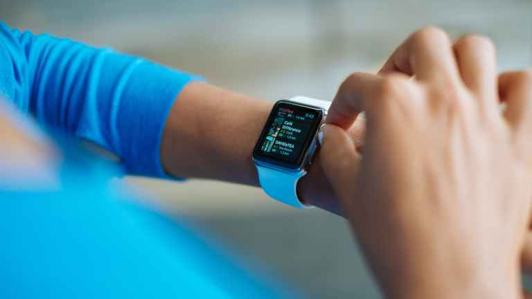 Wearable Technology; Adjusting Smart Watch on Left Wrist