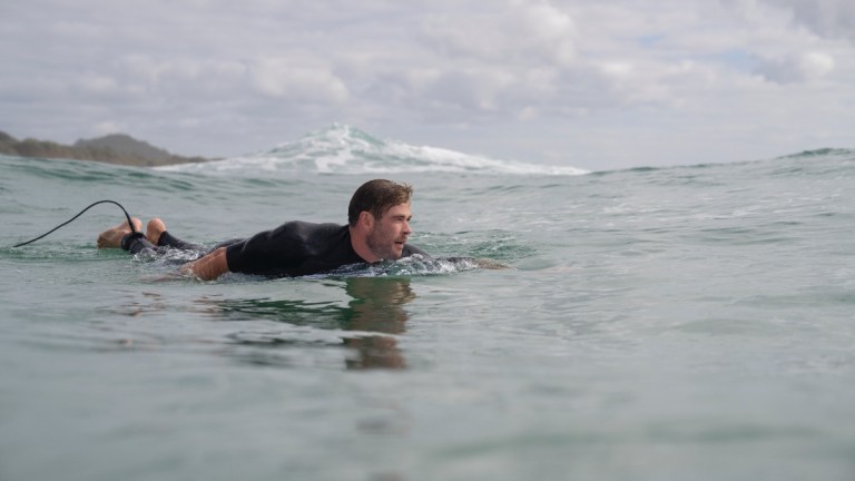 Chris Hemsworth surfing on Shark Beach with Chris Hemsworth