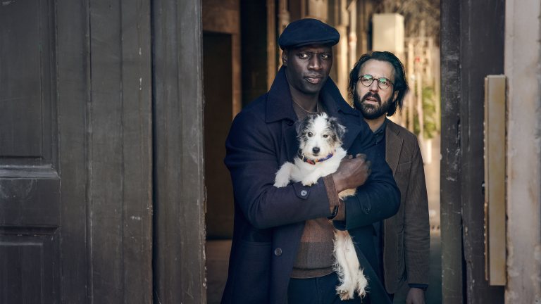 Assane Diop with a dog in Lupin season 2