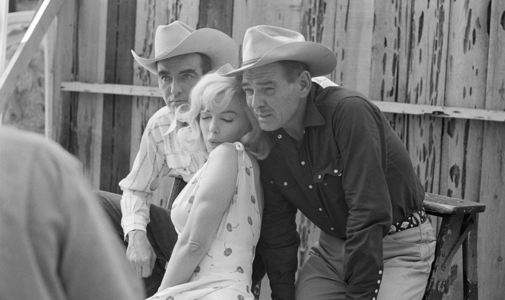 Clark Gable in 1960 with Marilyn Monroe and Montgomery Clift