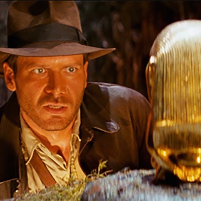 Indiana Jones and gold statue in Raiders of the Lost Ark