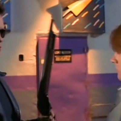 Arnold Schwarzenegger and Axl Rose in the Terminator 2 "You Could Be Mine" video.