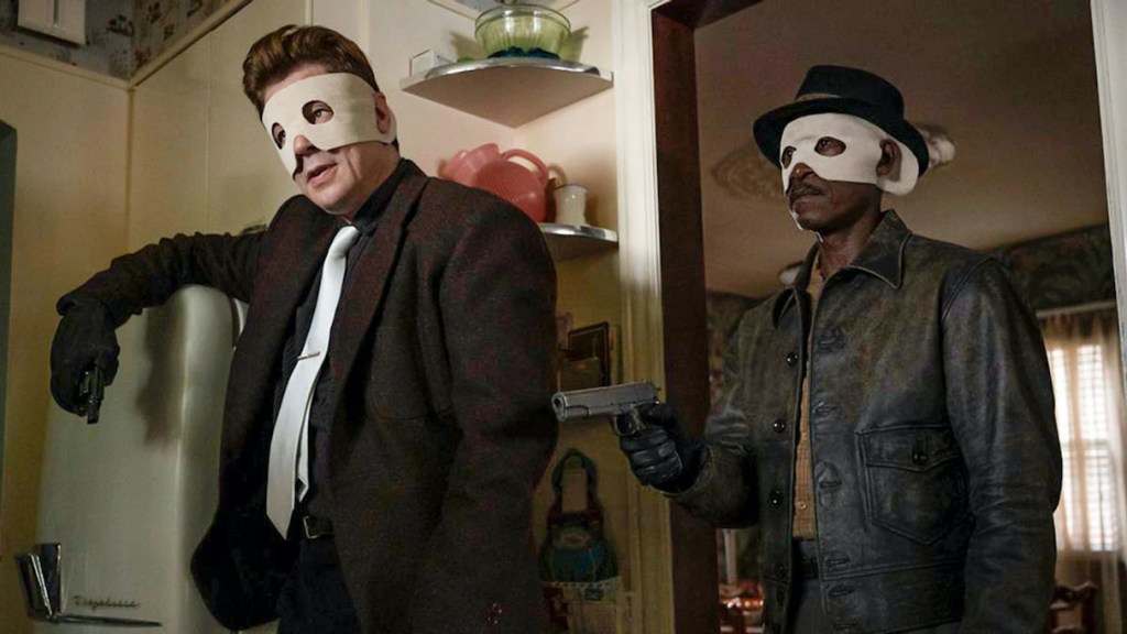 Benicio Del Toro and Don Cheadle with gun in No Sudden Move