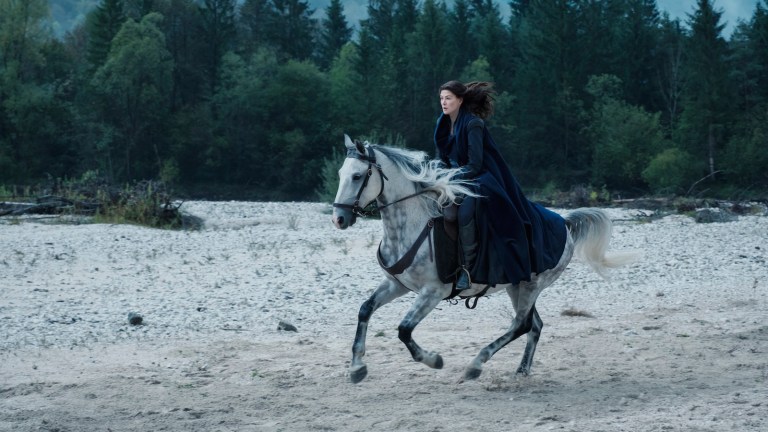 Moiraine riding a horse in Wheel of Time