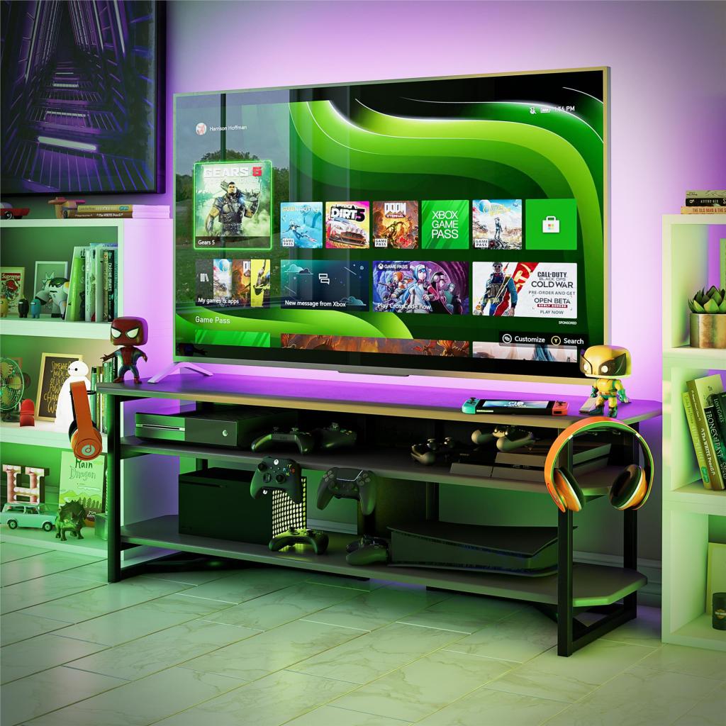 Smart TV, gaming consoles, and entertainment setup in green lighting.