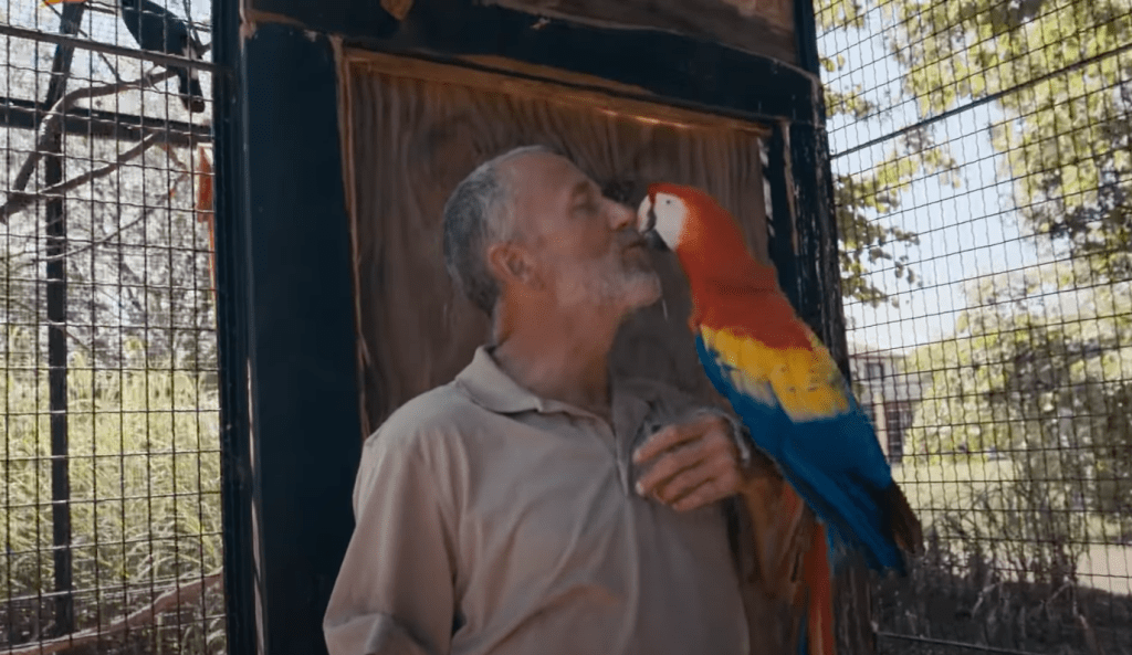 Jeff Lowe and a macaw
