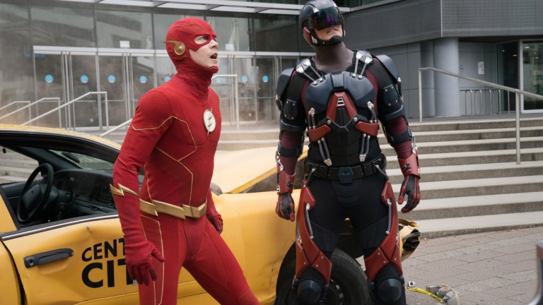 Grant Gustin as The Flash and Brandon Routh as Ray Palmer/Atom in The Flash Season 8 Episode 1 Armageddon