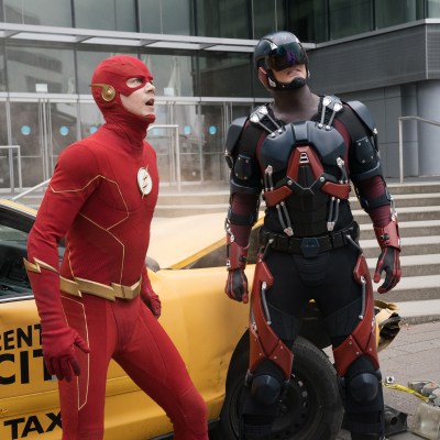 Grant Gustin as The Flash and Brandon Routh as Ray Palmer/Atom in The Flash Season 8 Episode 1 Armageddon