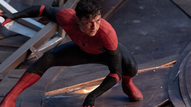 Tom Holland crouches as Spider-Man in No Way Home