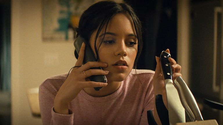 Jenna Ortega with knife in Scream opening