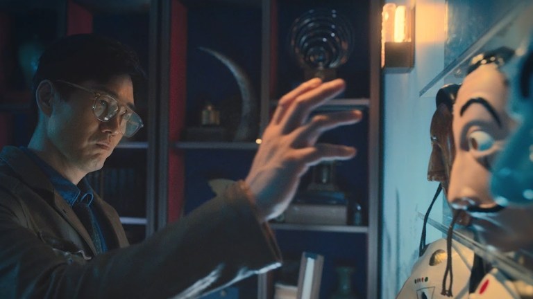 The Professor reaches for a Dali mask in the trailer for Money Heist: Korea