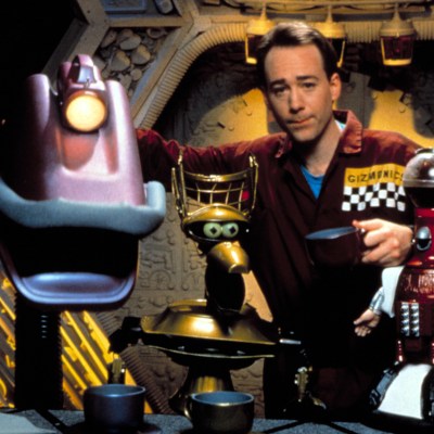 Joel and the Bots in MST3K. MYSTERY SCIENCE THEATER 3000, Gypsy, Joel Hodgson, Tom Servo, 1988-1999. (c) Comedy Central/ Courtesy: Everett Collection.